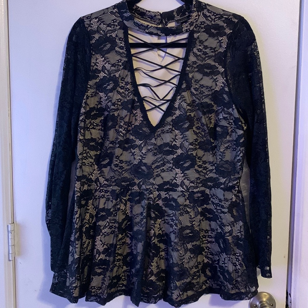 Torrid top.  Very sexy low cut.  Torrid size 1